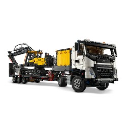 Volvo FMX LKW mit EC230 Electric Raupenbagger